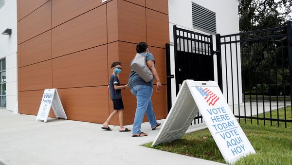 Voters cast their ballots on the last day of early voting for the U.S. presidential election at the C. Blythe Andrews, Jr. Public Library in East Tampa, Florida, U.S., August 16, 2020.  - Sputnik International