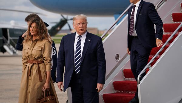 U.S. President Donald Trump, First Lady Melania Trump and Barron Trump disembark from Air Force One at Joint Base Andrews in Maryland, U.S., August 16, 2020 - Sputnik International
