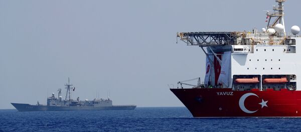 The Turkish drilling vessel Yavuz is seen being escorted by a Turkish Navy frigate in the eastern Mediterranean off Cyprus, August 6, 2019 - Sputnik International