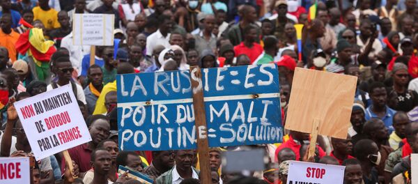 Supporters of the Imam Mahmoud Dicko and other opposition political parties attend a mass protest demanding the resignation of Mali's President Ibrahim Boubacar Keita in Bamako, Mali August 11, 2020. Supporters of the Imam Mahmoud Dicko and other opposition political parties attend a mass protest demanding the resignation of Mali's President Ibrahim Boubacar Keita in Bamako, Mali August 11, 2020. - Sputnik International