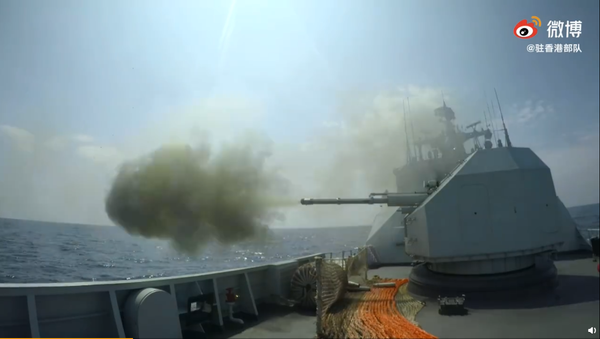 The Chinese corvette Huizhou fires its main gun in live-fire drills in the South China Sea on August 15, 2020 - Sputnik International