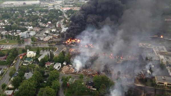 The crude-by-rail explosion in Lac-Mégantic, Canada, killed 47 people in 2013. - Sputnik International
