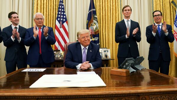 U.S. President Donald Trump receives applause after announcing that Israel and the United Arab Emirates have reached a peace deal that will lead to  full normalization of diplomatic relations between the two Middle Eastern nations in an agreement that Trump helped broker, at White House in Washington, U.S., August 13, 2020.  - Sputnik International