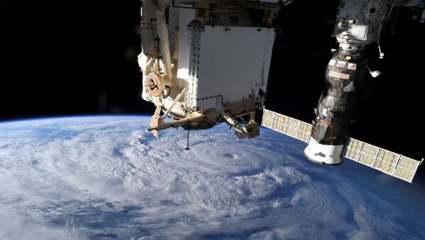 Hurricane Genevieve is seen from the International Space Station (ISS) - Sputnik International
