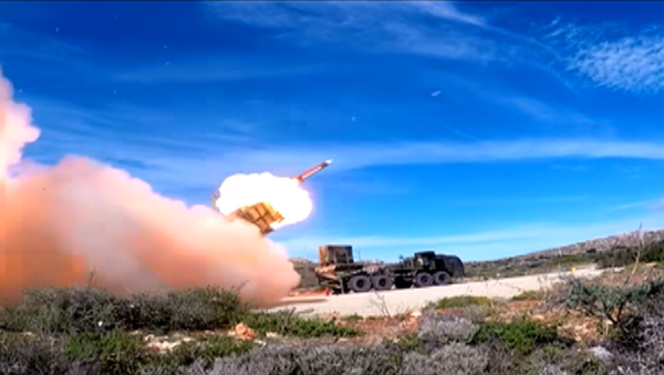 An MIM-104 Patriot surface-to-air missile is fired during a test on Crete - Sputnik International