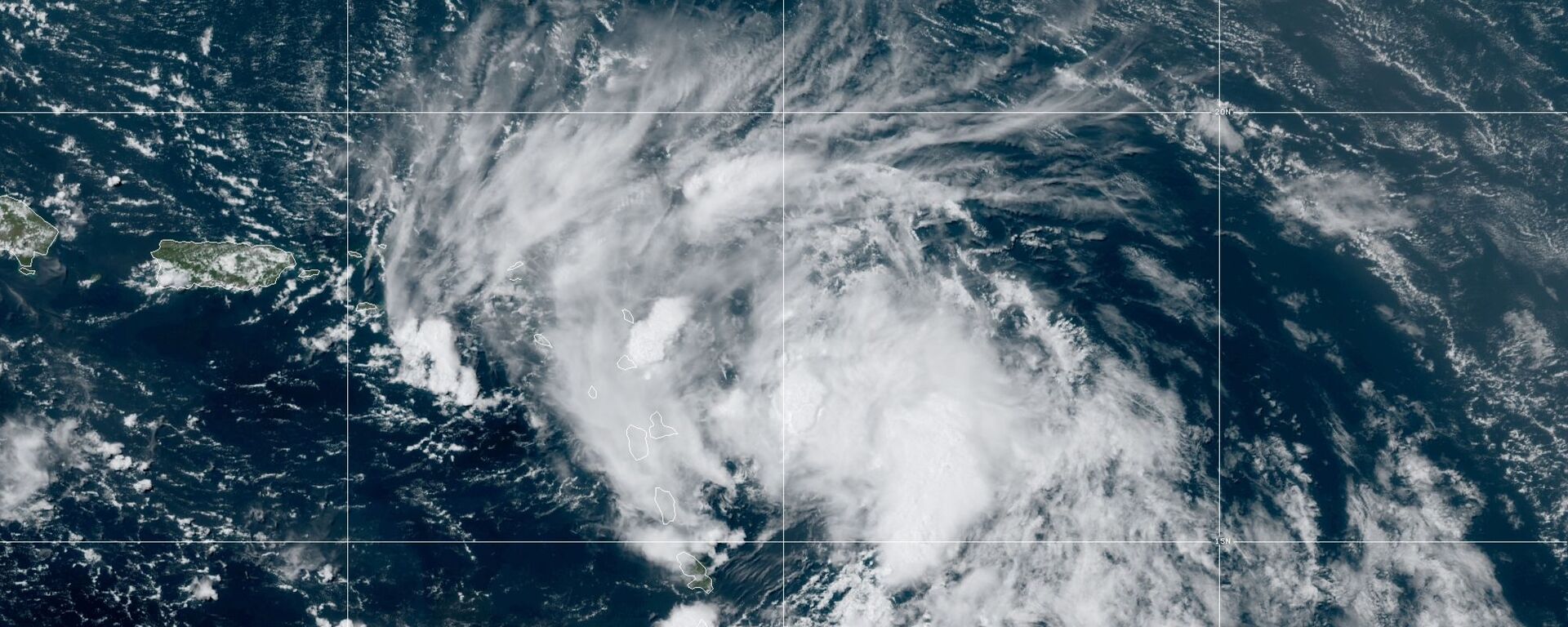 Satellite image released by the National Oceanic and Atmospheric Administration (NOAA) shows Tropical Storm Laura in the North Atlantic Ocean, Friday, Aug. 21, 2020.  - Sputnik International, 1920, 23.08.2020