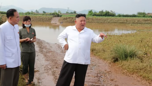 North Korean leader Kim Jong-un inspects a flood-damaged area in the country's northeast, August 2020. - Sputnik International