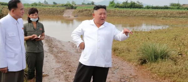 North Korean leader Kim Jong-un inspects a flood-damaged area in the country's northeast, August 2020. - Sputnik International
