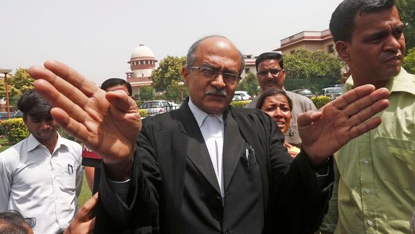 FILE PHOTO: Prashant Bhushan, a senior lawyer representing the petitioner, speaks with the media after India's Supreme Court dismissed petitions calling for an investigation into the death of Judge B. Loya, a lower court judge, outside the Supreme Court in New Delhi, India April 19, 2018 - Sputnik International
