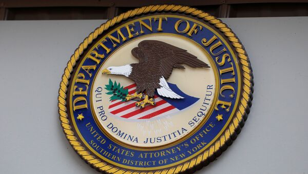 The seal of the United States Department of Justice is seen on the building exterior of the United States Attorney's Office of the Southern District of New York in Manhattan, New York City, U.S., August 17, 2020. - Sputnik International