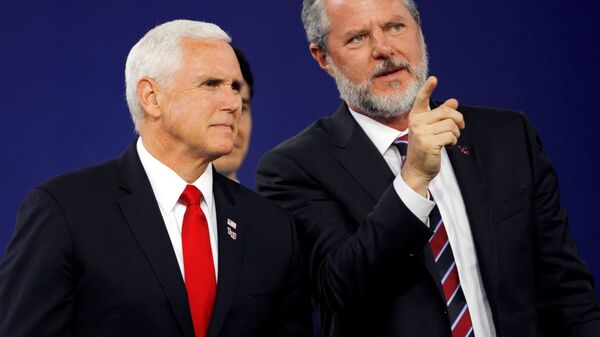 FILE PHOTO: Liberty University President Jerry Falwell Jr. and U.S. Vice President Mike Pence prepare to leave at the end of the school's commencement ceremonies in Lynchburg, Virginia, U.S., May 11, 2019.  - Sputnik International