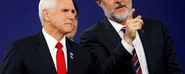FILE PHOTO: Liberty University President Jerry Falwell Jr. and U.S. Vice President Mike Pence prepare to leave at the end of the school's commencement ceremonies in Lynchburg, Virginia, U.S., May 11, 2019.  - Sputnik International