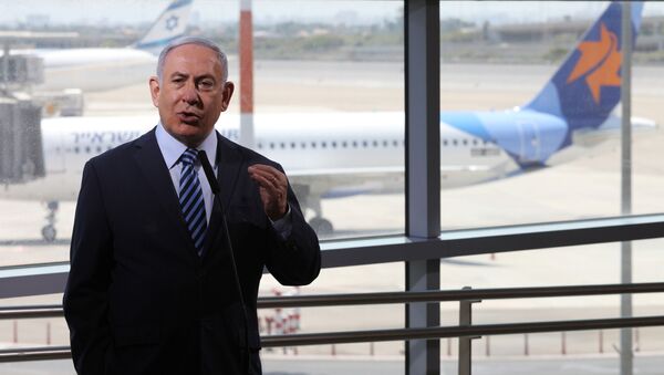 Israeli Prime Minister Benjamin Netanyahu gestures as he gives a statement at Ben Gurion International Airport, in Lod, near Tel Aviv, Israel August 17, 2020.  - Sputnik International