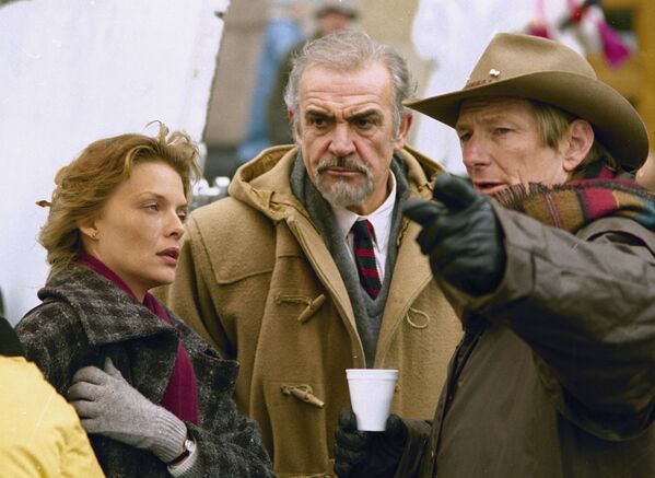 Actress Michelle Pfeiffer, left, and actor Sean Connery discuss an upcoming scene with director Fred Schepisi during a break in filming in Moscow of The Russian House, based on the spy novel by John Le Carre, Oct. 13, 1989.   - Sputnik International