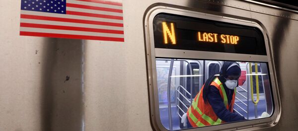 A worker wipes down surfaces as the MTA Subway closed overnight for cleaning and disinfecting during the outbreak of the coronavirus disease (COVID-19) in the Brooklyn borough of New York City, U.S., May 7, 2020. A worker wipes down surfaces as the MTA Subway closed overnight for cleaning and disinfecting during the outbreak of the coronavirus disease (COVID-19) in the Brooklyn borough of New York City, U.S., May 7, 2020. - Sputnik International