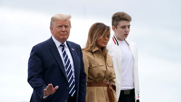 U.S. President Donald Trump, First Lady Melania Trump and their son Barron arrive to depart from Air Force One at Morristown Municipal Airport to return to Washington, in New Jersey, U.S., August 16, 2020. - Sputnik International