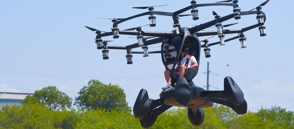 Matt Chasen, LIFT Aircraft chief executive officer, pilots the electric vertical takeoff and landing (eVTOL) Hexa over Camp Mabry, Texas, Aug. 20, 2020. Matt Chasen, LIFT Aircraft chief executive officer, pilots the electric vertical takeoff and landing (eVTOL) Hexa over Camp Mabry, Texas, Aug. 20, 2020. - Sputnik International