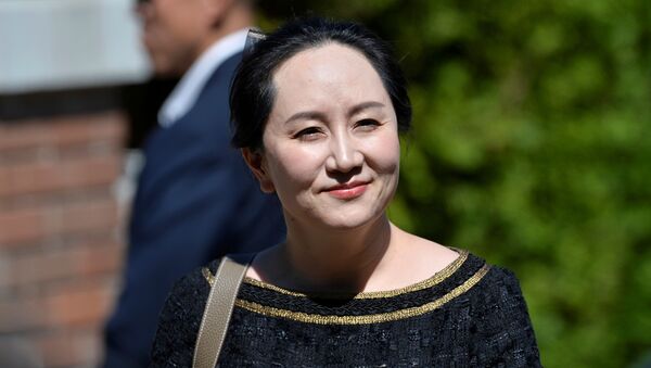Huawei Technologies Chief Financial Officer Meng Wanzhou smiles as she leaves her home to attend a court hearing in Vancouver, British Columbia, Canada May 27, 2020. - Sputnik International