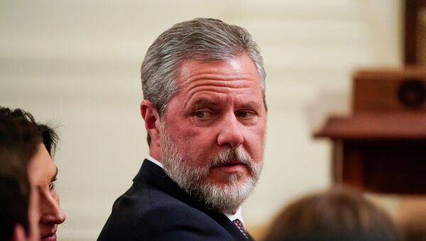 Jerry Falwell Jr., president of Liberty University, awaits the arrival of U.S. President Donald Trump to sign an executive order linking free speech efforts at public universities to federal grants in the East Room at the White House in Washington, U.S., March 21, 2019. - Sputnik International