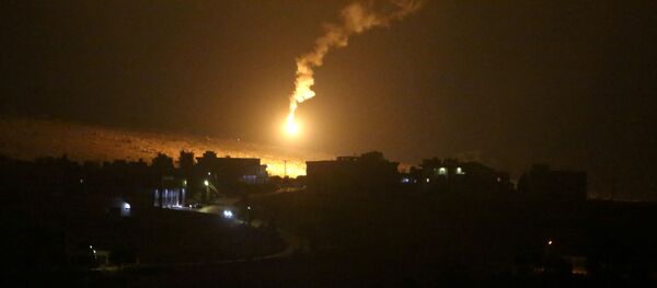 Smoke and flare are seen in the sky, as pictured from Houla village near the Lebanese-Israeli border, in southern Lebanon, August 25, 2020 - Sputnik International