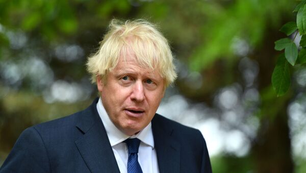 Britain's Prime Minister Boris Johnson meets veterans following the VJ Day National Remembrance event, held at the National Memorial Arboretum in Staffordshire, Britain August 15, 2020.  - Sputnik International