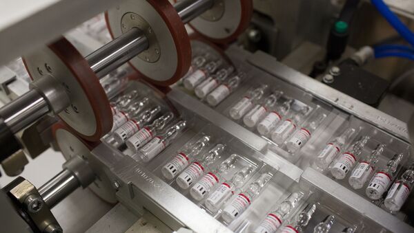 A handout photo shows vials during the production of Gam-COVID-Vac vaccine against the coronavirus disease (COVID-19), developed by the Gamaleya National Research Institute of Epidemiology and Microbiology and the Russian Direct Investment Fund (RDIF), at Binnopharm pharmaceutical company in Zelenograd near Moscow, Russia August 7, 2020 - Sputnik International
