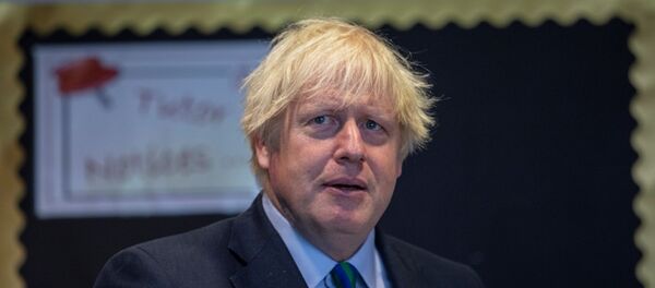 Britain's Prime Minister Boris Johnson visits Castle Rock school on the pupil's first day back to school, in Coalville, Britain August 26, 2020.  - Sputnik International