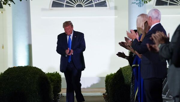 U.S. President Donald Trump arrives to listen to first lady Melania Trump deliver her live address to the largely virtual 2020 Republican National Convention from the Rose Garden of the White House in Washington, U.S., August 25, 2020. - Sputnik International