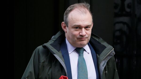 Britain's Secretary of State for Energy and Climate Change Ed Davey leaves 10 Downing Street in central London, March 18, 2015 - Sputnik International