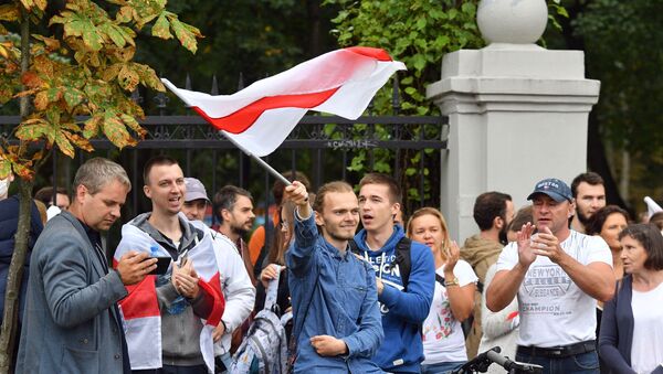 Participants of the rally in support of members of the Belarus Presidium of the Opposition Coordination Council Maxim Znaak and Sergei Dylevsky  - Sputnik International