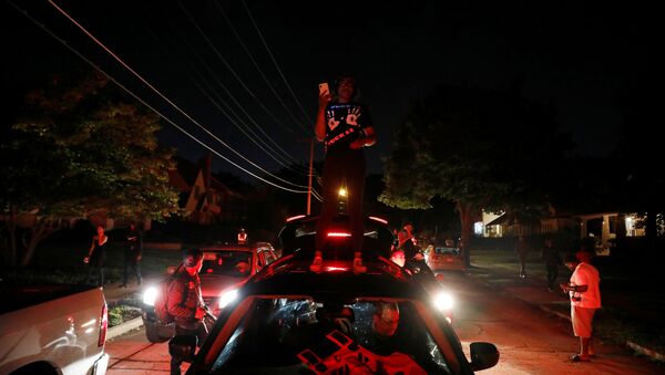 Demonstrators take part in a protest following the police shooting of Jacob Blake, a Black man, in Kenosha, Wisconsin, U.S. August 26, 2020. - Sputnik International