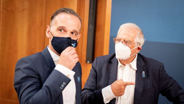 German Foreign Minister Heiko Maas and European Union (EU) foreign policy chief Josep Borell wear protective masks as they talk to each other during the EU foreign ministers' meeting in Berlin, Germany August, 27, 2020 - Sputnik International