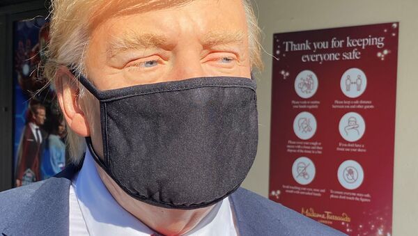 A waxwork of U.S. President Donald Trump is seen outside Madame Tussauds London to mark the tourist attraction's reopening after more than four months of closure due to the coronavirus disease (COVID-19) pandemic in London, Britain July 30, 2020 - Sputnik International