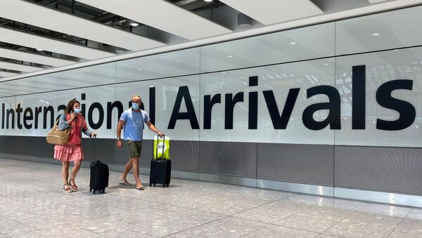 Passengers from international flights arrive at Heathrow Airport, following the outbreak of the coronavirus disease (COVID-19), London, Britain, July 29, 2020 - Sputnik International