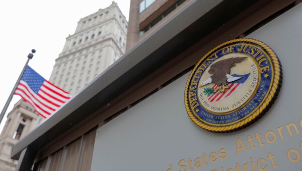 The seal of the United States Department of Justice is seen on the building exterior of the United States Attorney's Office of the Southern District of New York in Manhattan, New York City, U.S., August 17, 2020.  - Sputnik International