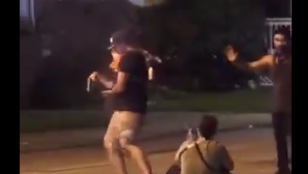 Screenshot from a video showing Kyle Rittenhouse shooting Gaige Grosskreutz, who has a gun in his hand, during protests in Kenosha, Wisconsin - Sputnik International