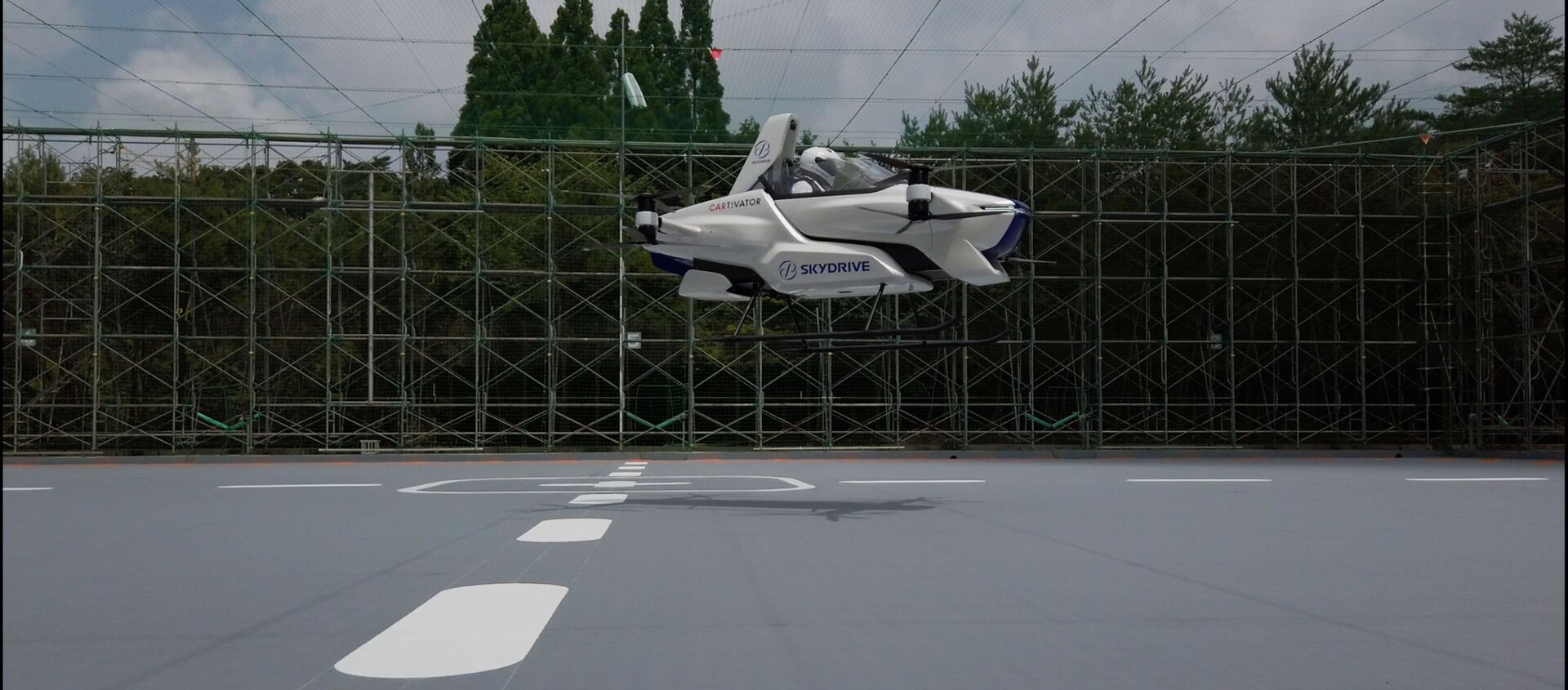 A manned flying car SD-03 is seen during a test flight session at Toyota test field in Toyota, central Japan, in this handout photo taken in August 2020 and released by SkyDrive/CARTIVATOR 2020, and obtained by Reuters August 29, 2020. SkyDrive/CARTIVATOR 2020 - Sputnik International, 1920, 29.08.2020