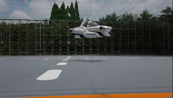 A manned flying car SD-03 is seen during a test flight session at Toyota test field in Toyota, central Japan, in this handout photo taken in August 2020 and released by SkyDrive/CARTIVATOR 2020, and obtained by Reuters August 29, 2020. SkyDrive/CARTIVATOR 2020 - Sputnik International