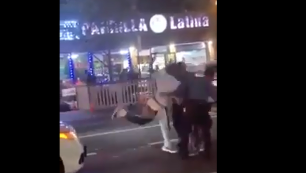A screenshot from a video of a driver assaulting two New York Police Department traffic officers in the Bronx, New York, US, on 26 August 2020. - Sputnik International
