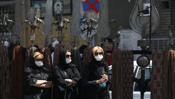 Iranian women wearing protective masks take part in a mourning ceremony ahead of Ashura, the holiest day on the Shi'ite Muslim calendar, amid the spread of the coronavirus disease (COVID-19), in Tehran, Iran August 29, 2020.  - Sputnik International