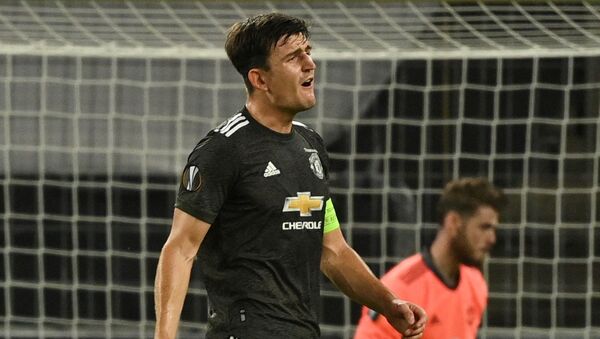Soccer Football - Europa League Semi Final - Sevilla v Manchester United - RheinEnergieSTADION, Cologne, Germany - August 16, 2020  Manchester United's Harry Maguire reacts, as play resumes behind closed doors following the outbreak of the coronavirus disease (COVID-19) - Sputnik International
