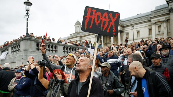 Protesters demonstrate against the lockdown and use of face masks in Trafalgar Square, amid the coronavirus disease (COVID-19) outbreak, in London, Britain, August 29, 2020. - Sputnik International