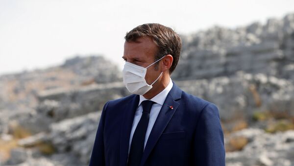 French President Emmanuel Macron attends a ceremony to plant a cedar with members of the NGO Jouzour Loubnan in Jaj, near Beirut, Lebanon September 1, 2020 - Sputnik International