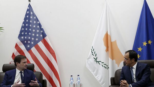 Cyprus' foreign minister Nikos Christodoulides, right, talks with Under Secretary of the United States of America, for Political Affairs, David Hale during their meeting at Larnaca international airport, Cyprus, Sunday, Aug. 16, 2020. Hale's brief stop in Cyprus comes amid heightened tensions over Turkey's hydrocarbons search in waters Greece and Cyprus claim as their own. - Sputnik International