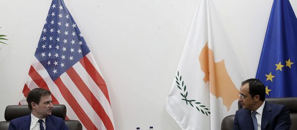 Cyprus' foreign minister Nikos Christodoulides, right, talks with Under Secretary of the United States of America, for Political Affairs, David Hale during their meeting at Larnaca international airport, Cyprus, Sunday, Aug. 16, 2020. Hale's brief stop in Cyprus comes amid heightened tensions over Turkey's hydrocarbons search in waters Greece and Cyprus claim as their own. Cyprus' foreign minister Nikos Christodoulides, right, talks with Under Secretary of the United States of America, for Political Affairs, David Hale during their meeting at Larnaca international airport, Cyprus, Sunday, Aug. 16, 2020. Hale's brief stop in Cyprus comes amid heightened tensions over Turkey's hydrocarbons search in waters Greece and Cyprus claim as their own. - Sputnik International