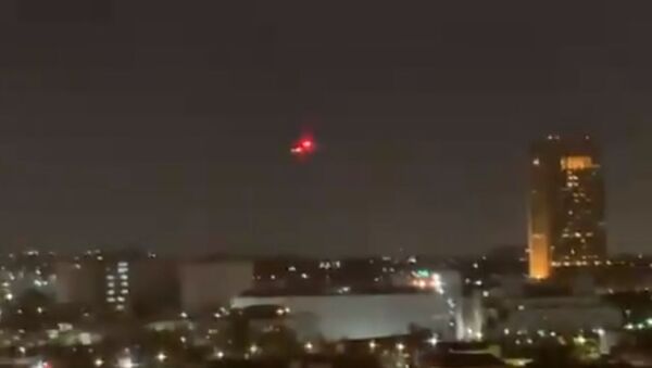 Unidentified helicopters flying over Los Angeles. Screenshot of video posted to Twitter. - Sputnik International