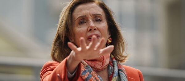 House Speaker Nancy Pelosi gestures while speaking about her visit to a hair salon during a news conference at the Mission Education Center Elementary School Wednesday, Sept. 2, 2020, in San Francisco - Sputnik International