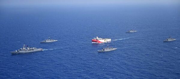This handout photograph released by the Turkish Defence Ministry on August 12, 2020, shows Turkish seismic research vessel 'Oruc Reis' (C) as it is escorted by Turkish Naval ships in the Mediterranean Sea, off Antalya on August 10, 2020. This handout photograph released by the Turkish Defence Ministry on August 12, 2020, shows Turkish seismic research vessel 'Oruc Reis' (C) as it is escorted by Turkish Naval ships in the Mediterranean Sea, off Antalya on August 10, 2020. - Sputnik International