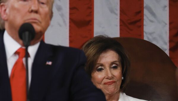 Speaker of the US House of Representatives Nancy Pelosi looks at a copy of US President Donald Trump's speech while he delivers the State of the Union address at the US Capitol in Washington, DC, on February 4, 2020.  - Sputnik International