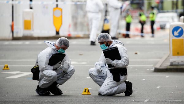 Forensics officers are seen near the scene of reported stabbings in Birmingham, Britain, September 6, 2020.  - Sputnik International